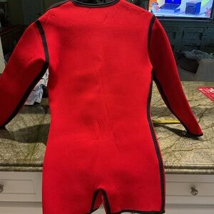 Men’s neoprene, unisex wet suit, onesie style. Fits men’s M/L